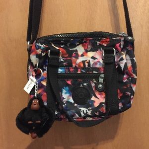 Kipling Crossbody Bag with Red and Blue Bird Print
